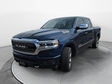 Used 2020 RAM 1500 Limited in a Patriot Blue Pearl Coat exterior color and Blackinterior. Perkins La Junta 719-383-2250 perkinslajunta.com 