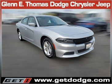 2021 Dodge Charger SXT in a Triple Nickel Clear Coat exterior color and Blackinterior. Glenn E Thomas 100 Years Of Excellence (866) 340-5075 getdodge.com 