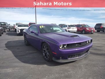 2023 Dodge Challenger R/T in a Plum Crazy exterior color and Blackinterior. Sahara Motors Ely LLC 775-251-8145 saharamotorsely.com 