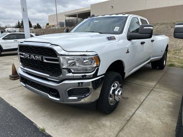 2024 RAM 3500 Tradesman Crew Cab 4x4 8' Box in a Bright White Clear Coat exterior color and Blackinterior. CDJR of Anytown 949-555-4321 pixelmotiondemo.com 