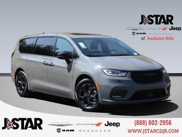 2023 Chrysler Pacifica Plug-in Hybrid Limited in a Ceramic Gray Clear Coat exterior color and Blackinterior. J Star Chrysler Dodge Jeep Ram of Anaheim Hills 888-802-2956 jstarcdjrofanaheimhills.com 