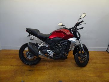 2019 Honda CB300R in a Red exterior color. New England Powersports 978 338-8990 pixelmotiondemo.com 