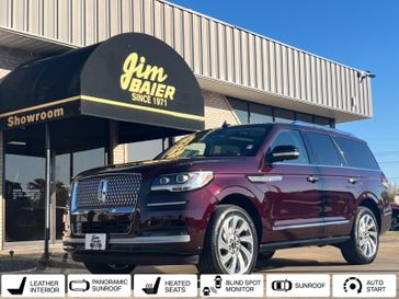 2024 Lincoln Navigator Reserve in a DIAMOND RED MET exterior color and SANDSTONEinterior. Jim Baier Inc 319-372-1012 jimbaier.com 