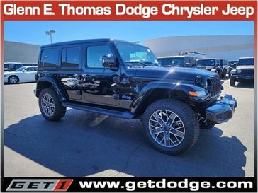 2024 Jeep Wrangler 4-door High Altitude 4xe in a Black Clear Coat exterior color and Blackinterior. Glenn E Thomas 100 Years Of Excellence (866) 340-5075 getdodge.com 
