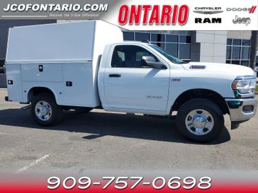 2022 RAM 2500 Tradesman in a Bright White Clear Coat exterior color and Blackinterior. Ontario Auto Center ontarioautocenter.com 