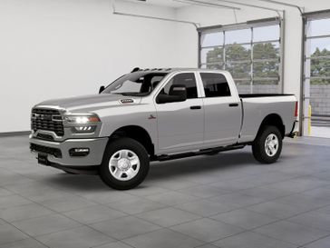 New 2026 RAM 2500 Tradesman Crew Cab 4x4 6'4' Box in a Silver-Zynith exterior color. Kamaaina Motors 1-808-746-7956 kamaainamotors.com 