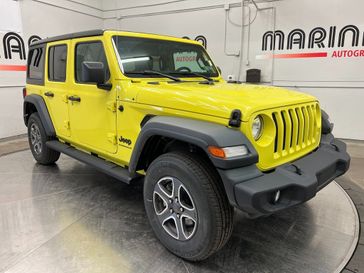 2023 Jeep Wrangler 4-door Sport S 4x4 in a High Velocity Clear Coat exterior color and Blackinterior. Marina Auto Group (855) 564-8688 marinaautogroup.com 