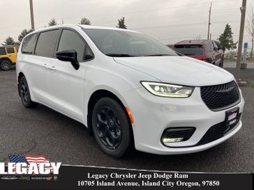 2023 Chrysler Pacifica Plug-in Hybrid Limited in a Bright White Clear Coat exterior color. Legacy Chrysler Jeep Dodge RAM 541-663-4885 legacychryslerjeepdodgeram.com 