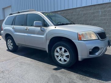 2011 Mitsubishi Endeavor LS in a Quick Silver Pearl exterior color and Blackinterior. Wilmington Auto Center Chrysler Dodge Jeep Ram (937) 556-6430 wilmingtonautocentercdjr.com 