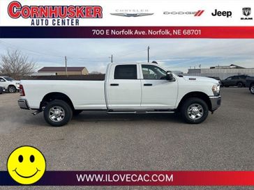 2024 RAM 3500 Tradesman in a Bright White Clear Coat exterior color and Blackinterior. Cornhusker Auto Center 402-866-8665 cornhuskerautocenter.com 