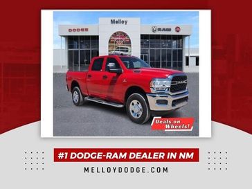 2024 RAM 2500 Tradesman Crew Cab 4x4 6'4' Box in a Flame Red Clear Coat exterior color. Melloy Dodge RAM FIAT 505-588-4459 melloydodge.com 