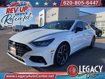 2021 Hyundai Sonata N Line in a Quartz White exterior color and Blackinterior. Legacy Auto Center 620-315-9264 legacyautocenter.net 