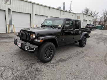 2024 Jeep GLADIATOR SPORT S 4X4 in a Black Clear Coat exterior color. Don White's Timonium Chrysler Dodge Jeep Ram 410-881-5409 donwhites.com 