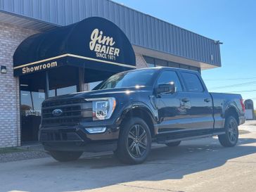 2021 Ford F-150 Lariat in a Agate Black Metallic exterior color and Blackinterior. Jim Baier Inc 319-372-1012 jimbaier.com 