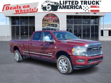 2024 RAM 3500 Limited in a Delmonico Red Pearl Coat exterior color and Blackinterior. Lifted Truck America 888-267-0644 liftedtruckamerica.com 