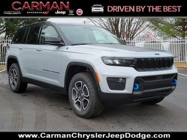 2024 Jeep Grand Cherokee Trailhawk 4xe in a Silver Zynith exterior color and Global Black - E6X7interior. Carman Chrysler Jeep Dodge Ram 302-317-2378 carmanchryslerjeepdodge.com 