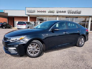 2020 Kia Optima LX in a Ebony Black exterior color and Blackinterior. Weeks Chrysler - Jeep Dodge 618-603-2267 weekschryslerjeep.com 