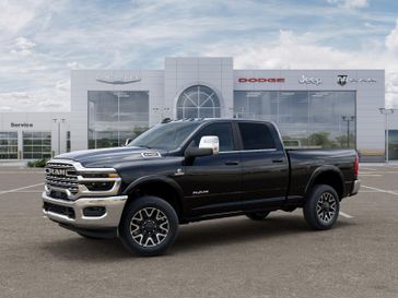 2025 RAM 2500 Limited Longhorn Crew Cab 4x4 6'4' Box in a Diamond Black Crystal Pearl Coat exterior color. Hometown Motors of Rockwell City 712-220-7644 hometownmotorsrc.com 