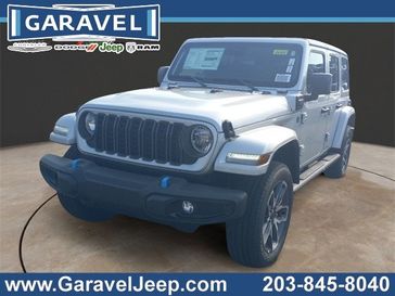 2024 Jeep Wrangler 4-door Sport S 4xe in a Silver Zynith Clear Coat exterior color and Blackinterior. Garavel Jeep 475-258-7987 norwalkjeep.com 