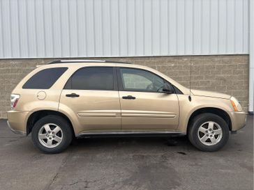 2005 Chevrolet Equinox LS in a Sandstone Metallic exterior color and Light Cashmereinterior. Wilmington Auto Center Chrysler Dodge Jeep Ram (937) 556-6430 wilmingtonautocentercdjr.com 