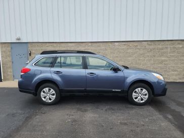 2013 Subaru Outback 2.5i in a Twilight Blue Metallic exterior color and Black Striatedinterior. Wilmington Auto Center Chrysler Dodge Jeep Ram (937) 556-6430 wilmingtonautocentercdjr.com 