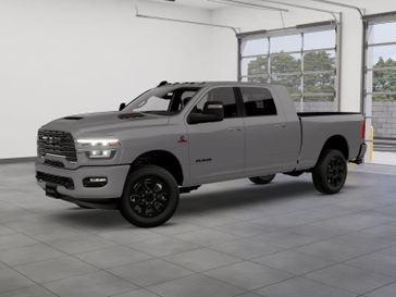 New 2026 RAM 2500 Laramie Mega Cab 4x4 6'4' Box in a Ceramic Gray Clear Coat exterior color. Kamaaina Motors 1-808-746-7956 kamaainamotors.com 