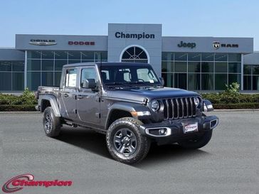 2023 Jeep Gladiator Sport 4x4 in a Granite Crystal Metallic Clear Coat exterior color and CLOTHinterior. Champion Chrysler Jeep Dodge Ram 800-549-1084 pixelmotiondemo.com 