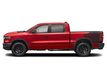 New 2026 RAM 1500 Rebel in a Molten Red Pearl Coat exterior color and Blackinterior. Perkins La Junta 719-383-2250 perkinslajunta.com 