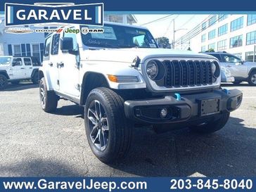 2024 Jeep Wrangler 4-door Sport S 4xe in a Silver Zynith Clear Coat exterior color and Blackinterior. Garavel Jeep 475-258-7987 norwalkjeep.com 