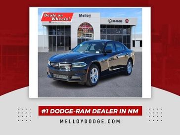 2022 Dodge Charger SXT in a Pitch Black Clear Coat exterior color and Blackinterior. Melloy Dodge RAM FIAT 505-588-4459 melloydodge.com 