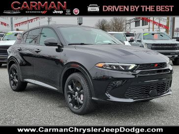 2024 Dodge Hornet R/T Eawd in a 8 Ball exterior color and Black - E6X9interior. Carman Chrysler Jeep Dodge Ram 302-317-2378 carmanchryslerjeepdodge.com 