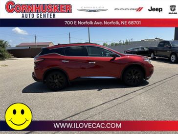 2017 Nissan Murano Platinum in a Cayenne Red Metallic exterior color and Graphiteinterior. Cornhusker Auto Center 402-866-8665 cornhuskerautocenter.com 