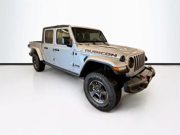 2023 Jeep Gladiator Rubicon 4x4 in a Silver Zynith Clear Coat exterior color and Blackinterior. Sheridan Motors CDJR 307-218-2217 sheridanmotor.com 