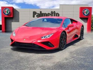 Used 2023 Lamborghini Huracan EVO Coupe RWD in a Rosso Mars Metallic exterior color and Nero Adeinterior. Palmetto Alfa Romeo-FIAT 786-526-0850 palmettoalfaromeofiat.com 