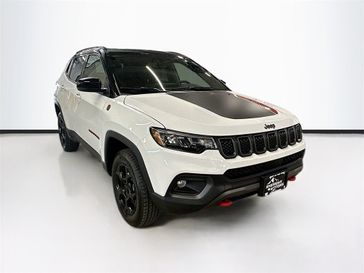 2023 Jeep Compass Trailhawk 4x4 in a Bright White Clear Coat exterior color and Ruby Red/Blackinterior. Sheridan Motors Auto (307) 218-2217 sheridanmotors.com 