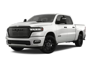 2025 RAM 1500 Laramie Crew Cab 4x4 5'7' Box in a Bright White Clear Coat exterior color. Wilmington Auto Center Chrysler Dodge Jeep Ram (937) 556-6430 wilmingtonautocentercdjr.com 