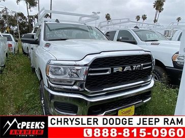 2022 RAM 2500 Tradesman Regular Cab 4x4 8' Box in a Bright White Clear Coat exterior color and Diesel Gray/Blackinterior. McPeek's Chrysler Dodge Jeep Ram of Anaheim 888-861-6929 mcpeeksdodgeanaheim.com 