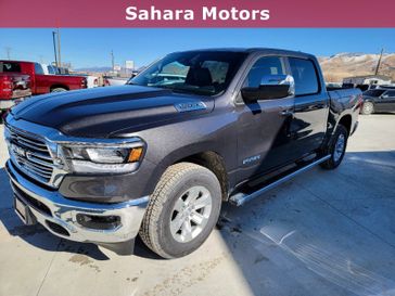 2024 RAM 1500 Laramie Crew Cab 4x4 5'7' Box in a Granite Crystal Metallic Clear Coat exterior color and Blackinterior. Sahara Motors Inc 435-500-5052 saharamotorschryslerdodgejeep.com 