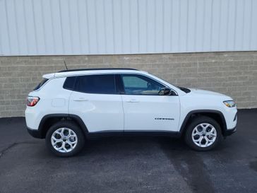 2025 Jeep Compass Latitude 4x4 in a Bright White Clear Coat exterior color and Blackinterior. Wilmington Auto Center Chrysler Dodge Jeep Ram (937) 556-6430 wilmingtonautocentercdjr.com 