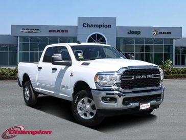 2024 RAM 2500 Big Horn Crew Cab 4x4 6'4' Box in a Bright White Clear Coat exterior color and CLOTHinterior. Champion Chrysler Jeep Dodge Ram 800-549-1084 pixelmotiondemo.com 