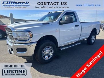 2024 RAM 3500 Tradesman Regular Cab 4x4 8' Box in a Bright White Clear Coat exterior color. Fillback Chrysler 6083754664 