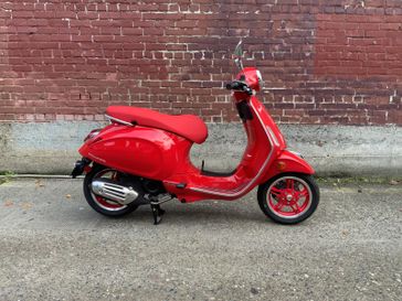 2025 Vespa PRIMAVERA 50 TECH  in a RED exterior color. Northwest Moto 206-783-2323 northwestmoto.com 