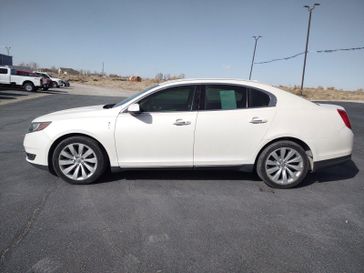 2014 Lincoln MKS  in a White exterior color. Sahara Motors Inc 435-500-5052 saharamotorschryslerdodgejeep.com 