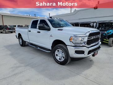 2024 RAM 2500 Tradesman Crew Cab 4x4 8' Box in a Bright White Clear Coat exterior color and Blackinterior. Sahara Motors Inc 435-500-5052 saharamotorschryslerdodgejeep.com 