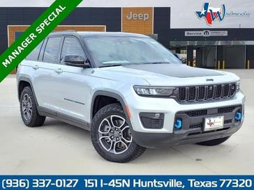2023 Jeep Grand Cherokee Trailhawk 4xe in a Silver Zynith exterior color and Global Blackinterior. Wischnewsky Dodge 936-755-5310 wischnewskydodge.com 