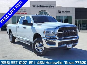 2024 RAM 2500 Tradesman Crew Cab 4x4 8' Box in a Bright White Clear Coat exterior color. Wischnewsky Dodge 936-755-5310 wischnewskydodge.com 