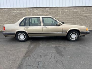 1994 Volvo 960 Action in a GOLD exterior color. Wilmington Auto Center Chrysler Dodge Jeep Ram (937) 556-6430 wilmingtonautocentercdjr.com 