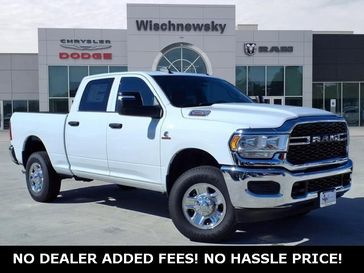 2024 RAM 2500 Tradesman Crew Cab 4x4 6'4' Box in a Bright White Clear Coat exterior color and Blackinterior. Wischnewsky Dodge 936-755-5310 wischnewskydodge.com 