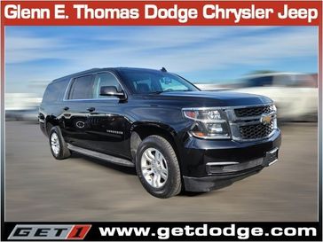 2015 Chevrolet Suburban 1500 LT in a Black exterior color and Jet Blackinterior. Glenn E Thomas 100 Years Of Excellence (866) 340-5075 getdodge.com 