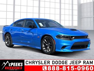 2023 Dodge Charger Scat Pack in a B5 Blue exterior color and Blackinterior. McPeek's Chrysler Dodge Jeep Ram of Anaheim 888-861-6929 mcpeeksdodgeanaheim.com 